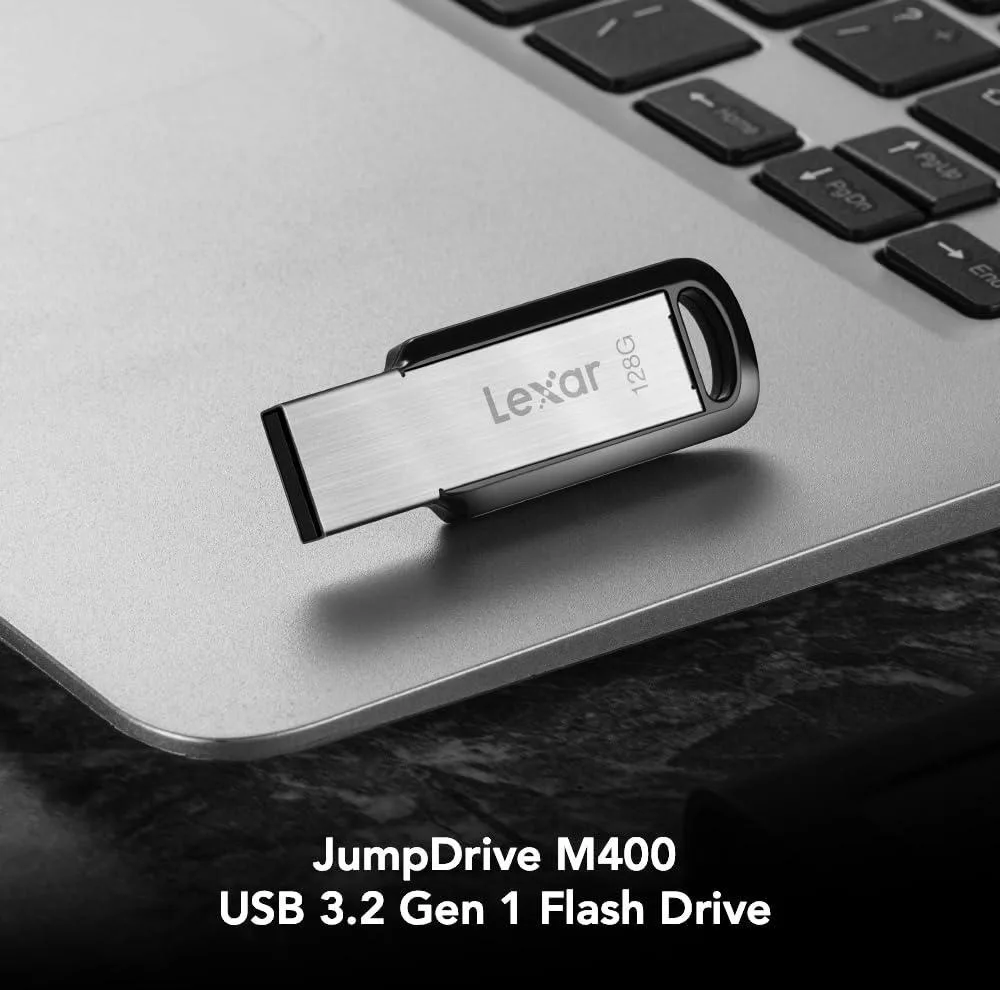 فلش مموری لکسار مدل M400 ظرفیت 128 گیگابایت رابط USB 3.0 مقاوم در برابر ضربه و سازگار با سیستم‌های PC و Mac
